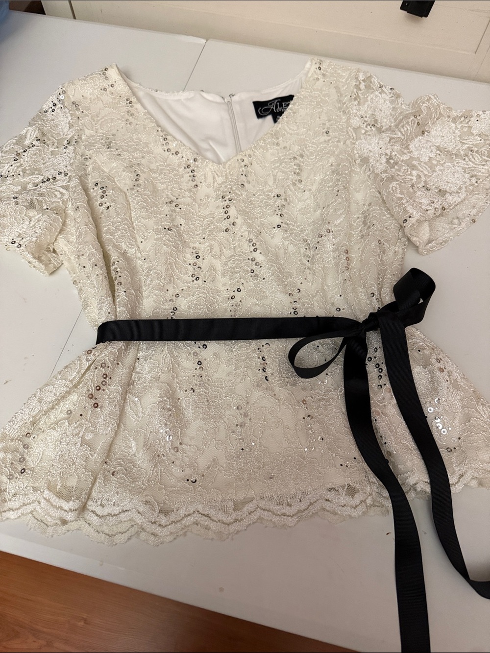 Alex Evenings Ivory Lace Sequin Peplum Top with Black Ribbon